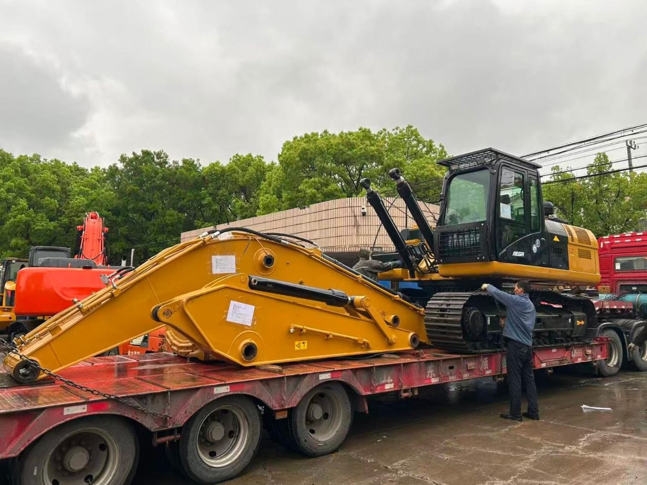 Heavy equipment loading for export
